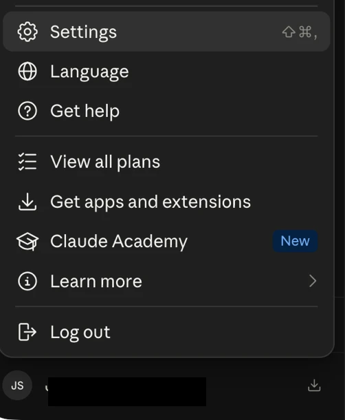 The account menu open at the bottom of the Claude sidebar, with Settings at the top of it.